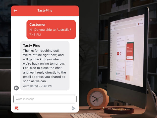An image of the business owner's back office in the evening. There's a chat window open with an away message telling the customer that live chat isn't available. Shopify Inbox captures email and phone numbers so the business owner can contact customers in the future.